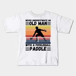 Never underestimate an old man with a pickleball paddle Kids T-Shirt